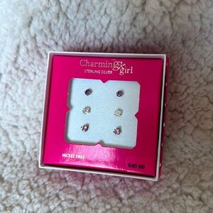 3 pair girls stud earrings. Never worn. Purple, pink, crystal